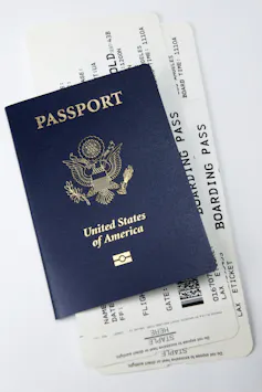 Passport and airline boarding pass tickets