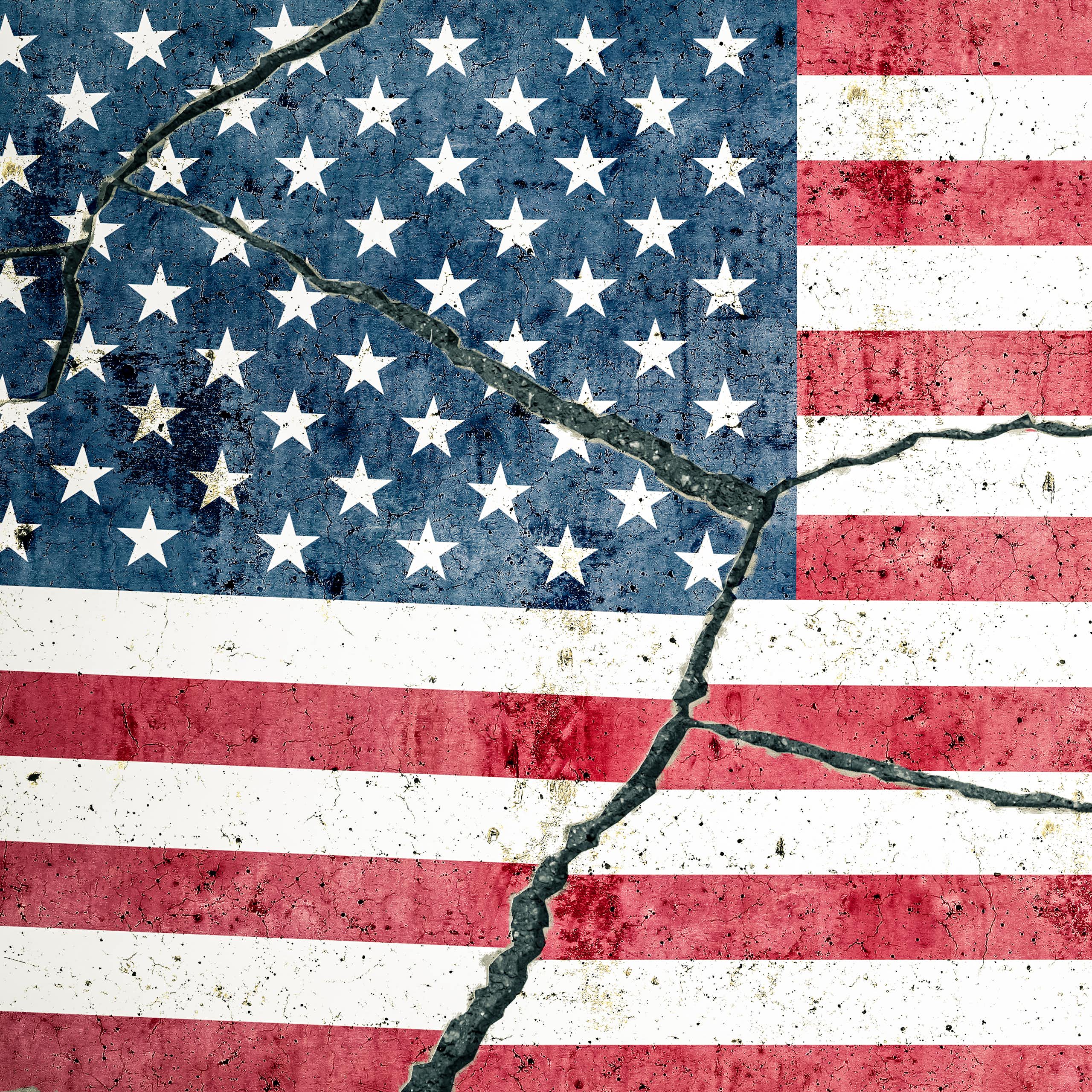 An American flag shows cracks down the center.