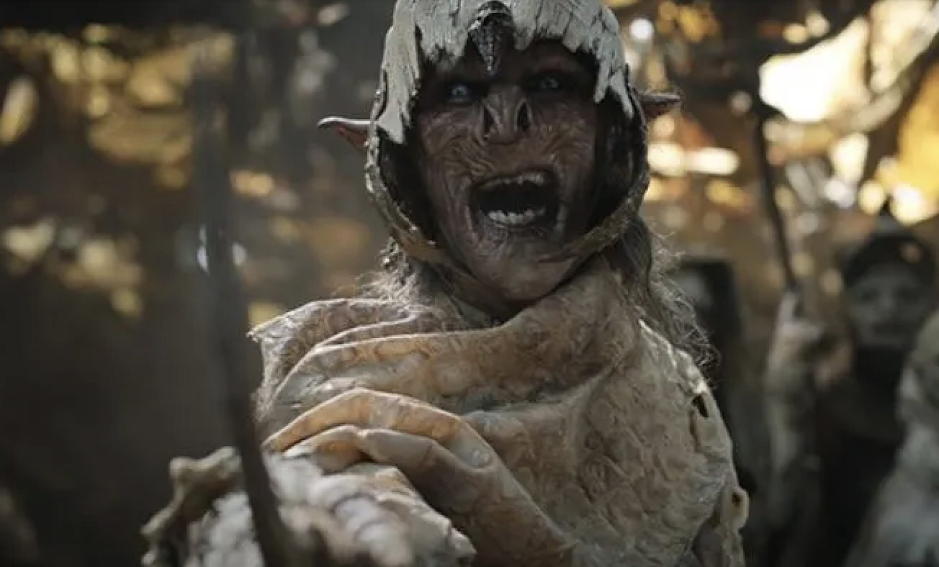 A orc holding a blade.