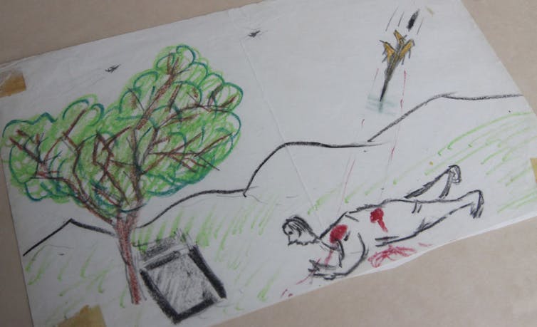 Rudimentary drawing of a bleeding man crawling while being shot by a fighter jet.