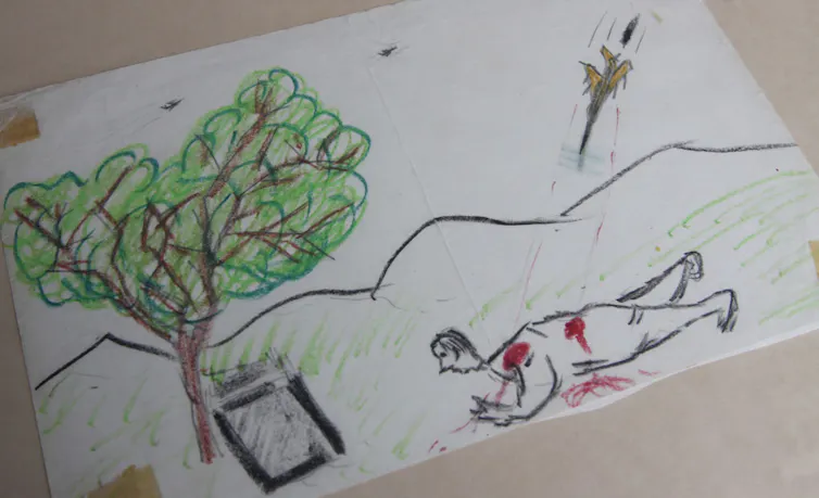 Rudimentary drawing of a bleeding man crawling while being shot by a fighter jet.