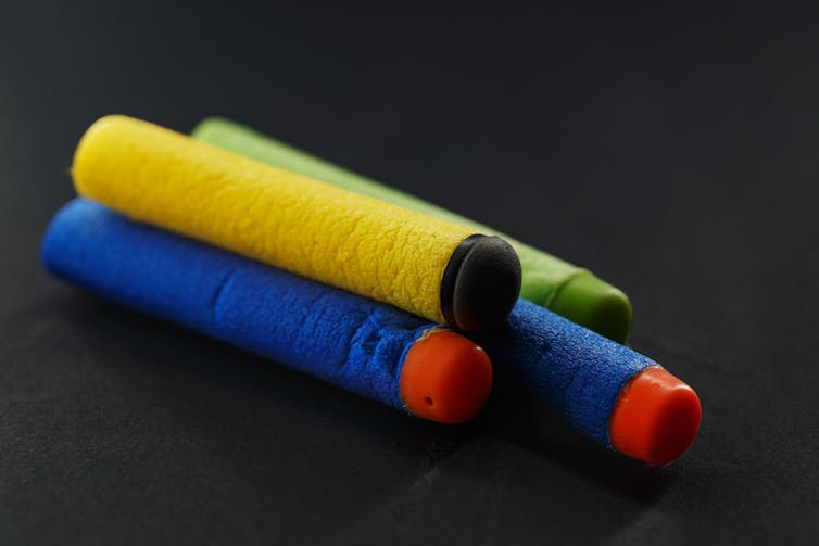 A pile of foam bullets for a toy gun.