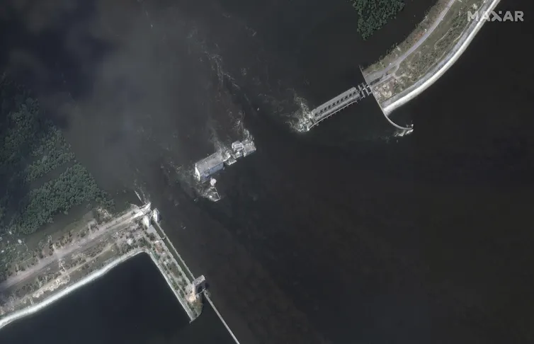 Aerial view of a dam cut in two