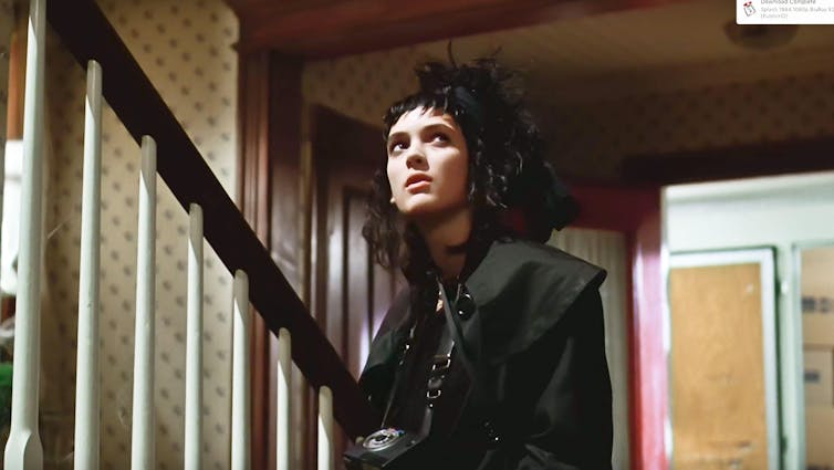 Young Winona Ryder in all black.