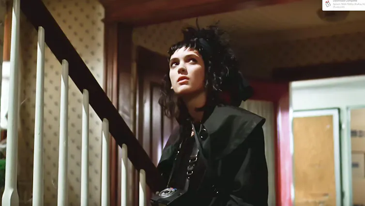 Young Winona Ryder in all black.
