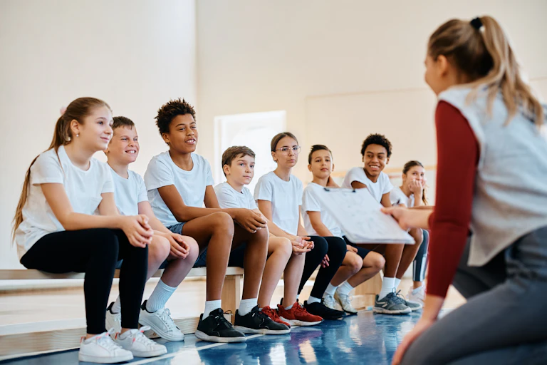 Students sit in a line