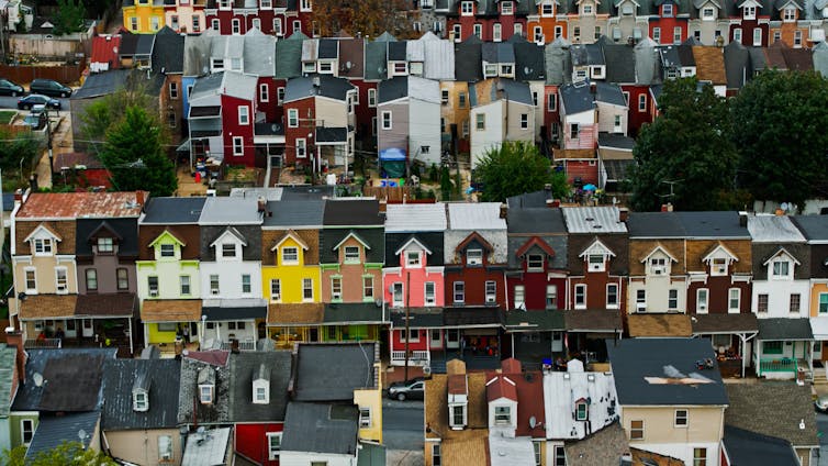 Aerial view of rows of colorful row homes