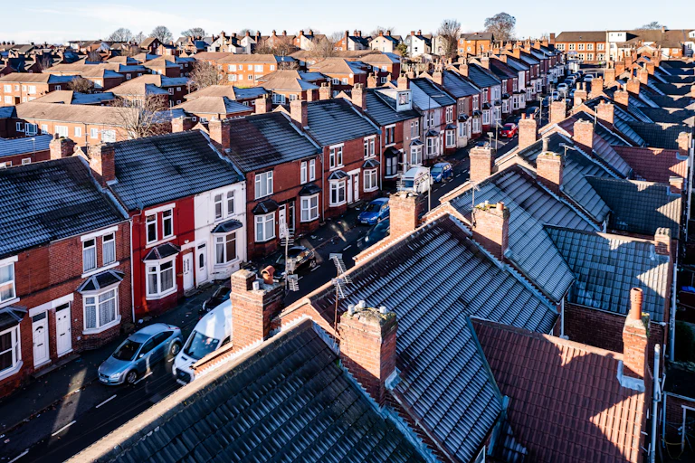 An aerial view of frosty terraced streets.