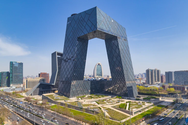 dramatic modern skyline of Beijing city centre, big busy roads, blue sky