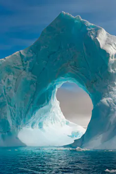 arch of ice in iceberg