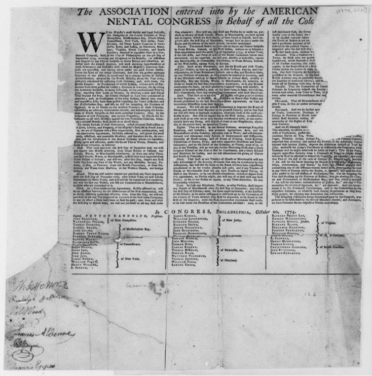 A large sheet of paper printed with three columns of text.