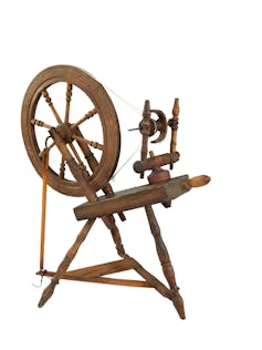 A machine for spinning fiber into thread.