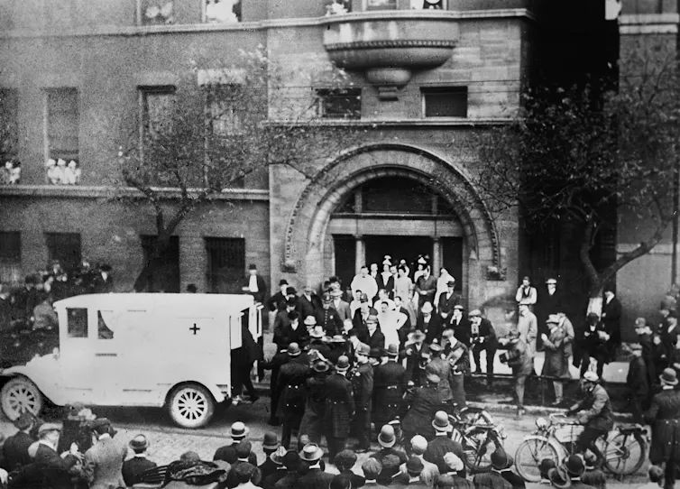 Theodore Roosevelt arrives at a hospital.