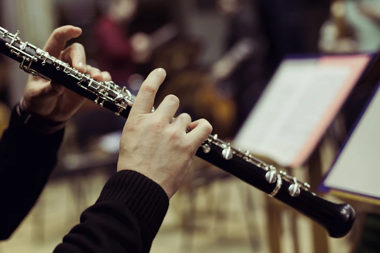 hands playing the oboe