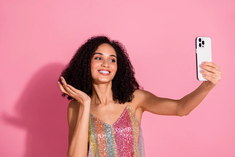 A woman takes a selfie