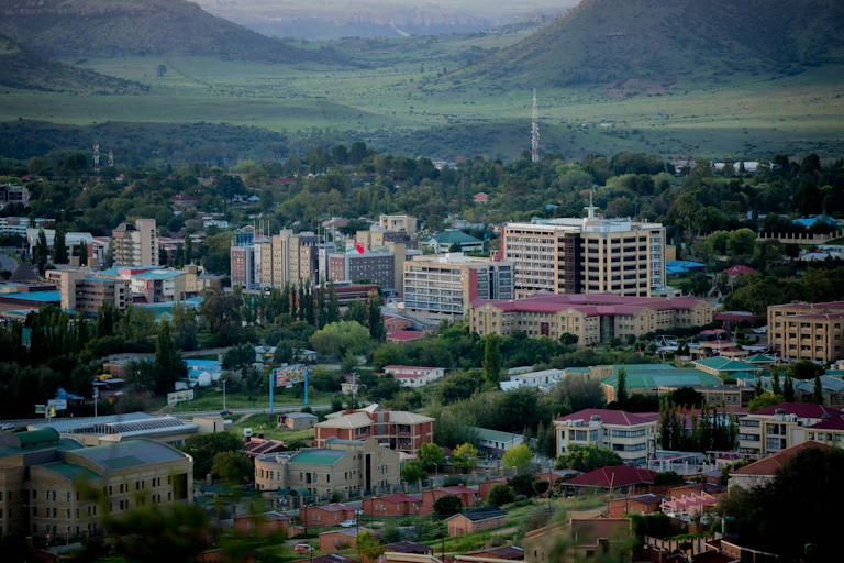 View from high point of a city in a hillly landscape