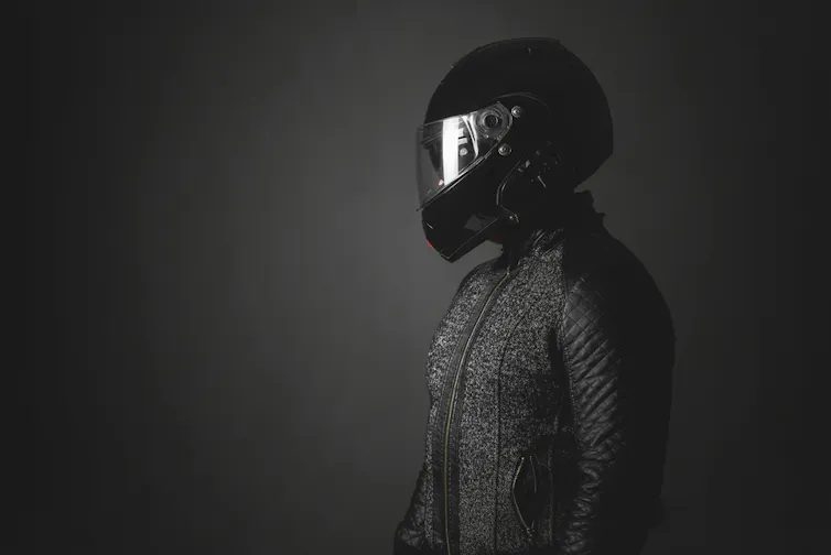 Man in a motorbike helmet