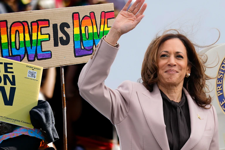 A composite image of a child holding a climate action sign, a rainbow sign with 'Love is Love' in block letters, Kamala Harris waving from the steps to Air Force One