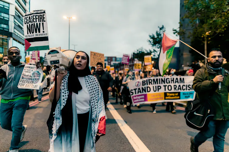 Palestine and Stand Up to Racism protesters in Birmingham.