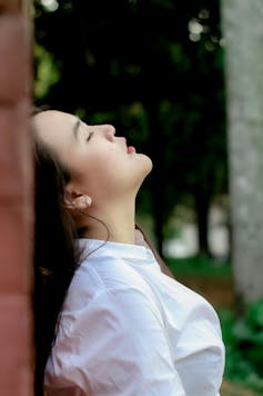 Teen closes her eyes