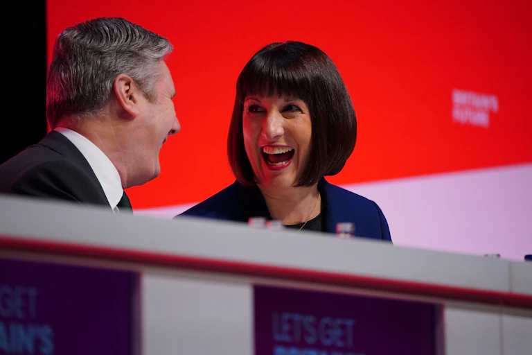 Keir Starmer and Rachel Reeves laughing together.