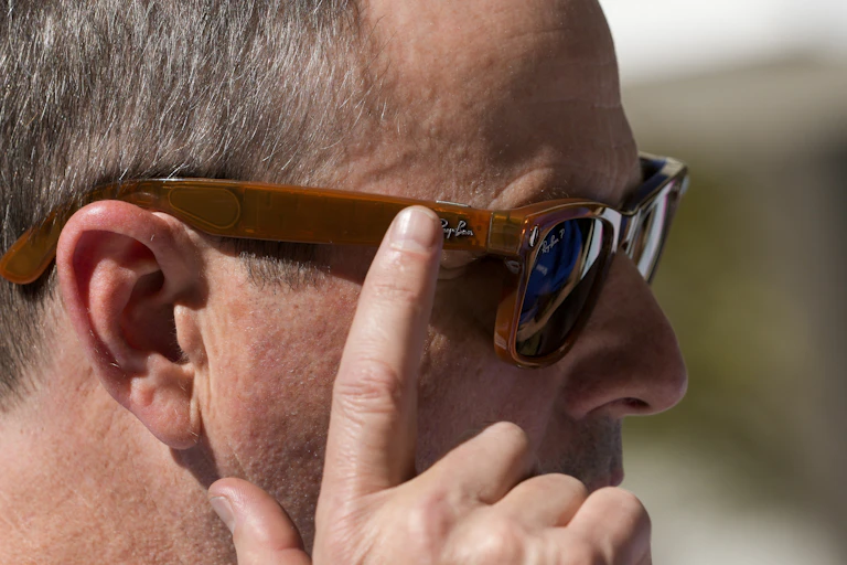 Close up of a man wearing sunglasses