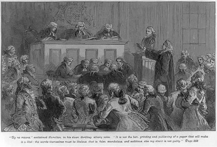 A black and white sketch of a 1700s courtroom