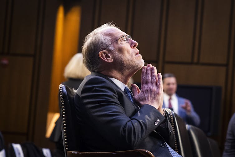 A man prays.