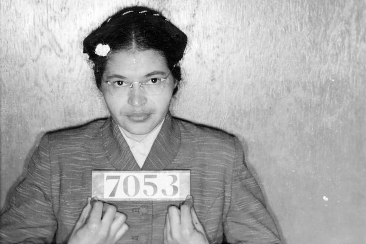 Mugshot of black woman Rosa Parks in 1956.