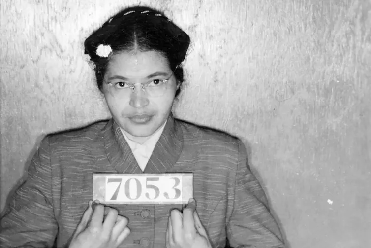 Mugshot of black woman Rosa Parks in 1956.