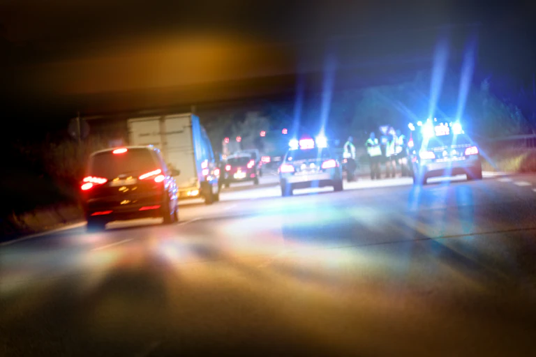 Police cruisers at night