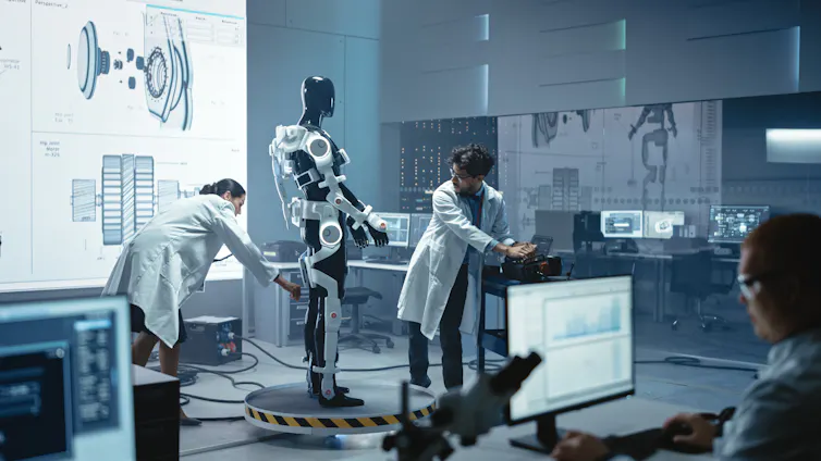 Engineers work on a bionics exoskeleton prototype