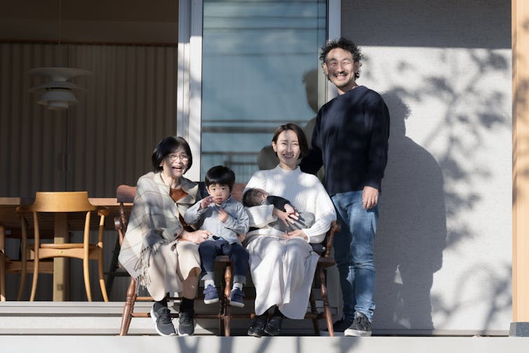 A grandmother, two parents, and two kids.