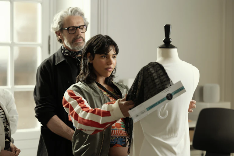 Lambert Wilson and Zita Hanrot looking at a mannequin