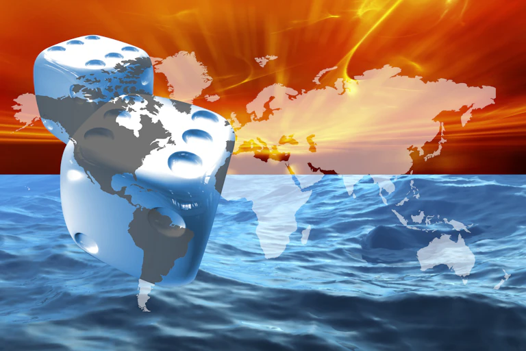 A colorful drawing of a pair of dice with continents on them hovering over the ocean.