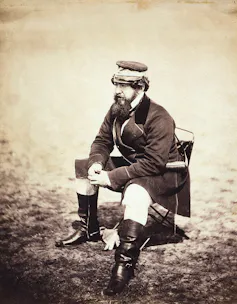 A man seated.