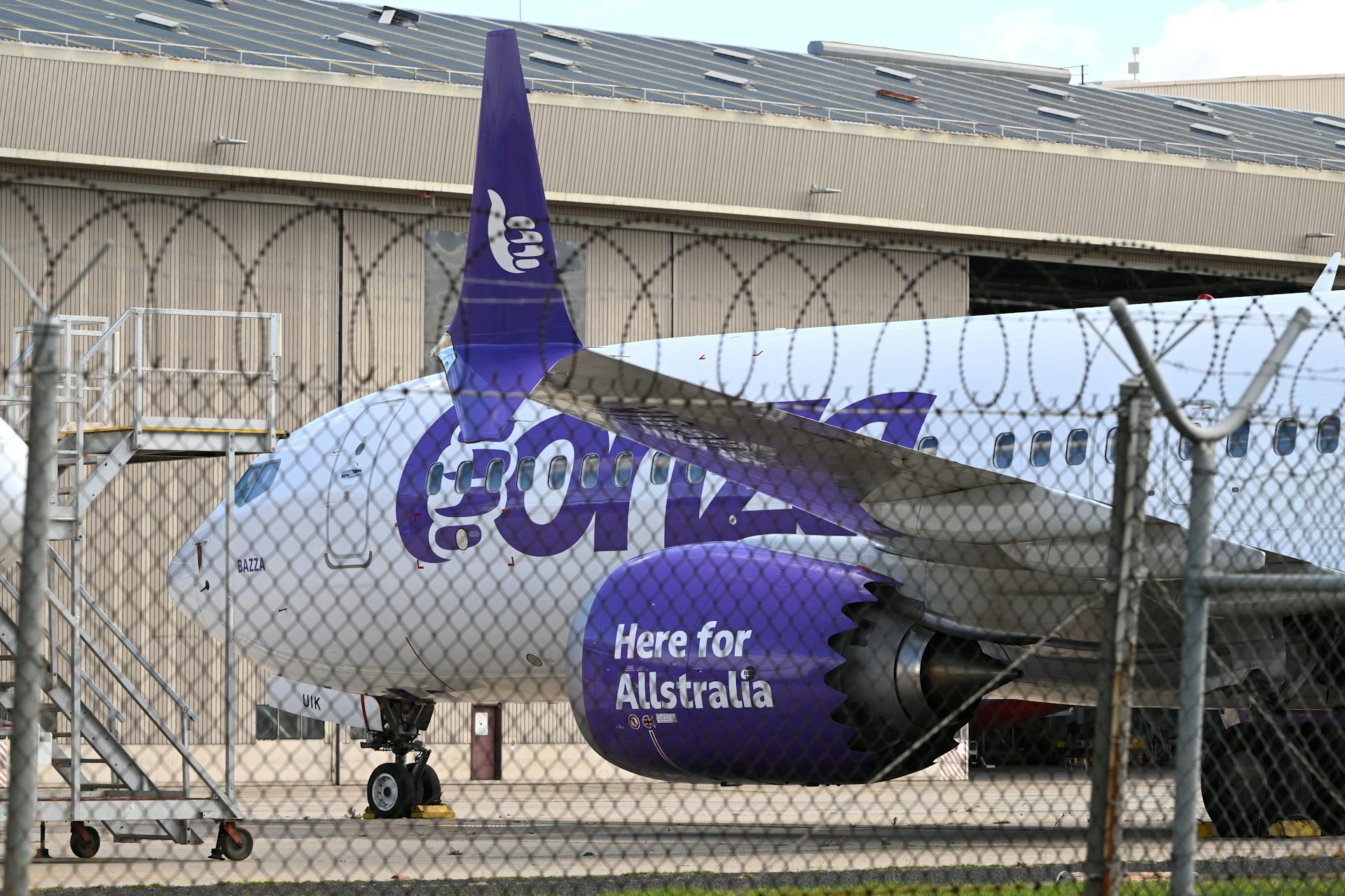 A plane sitting on a tarmac