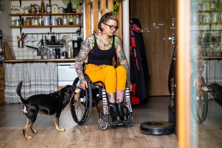 Woman in wheelchair at her home