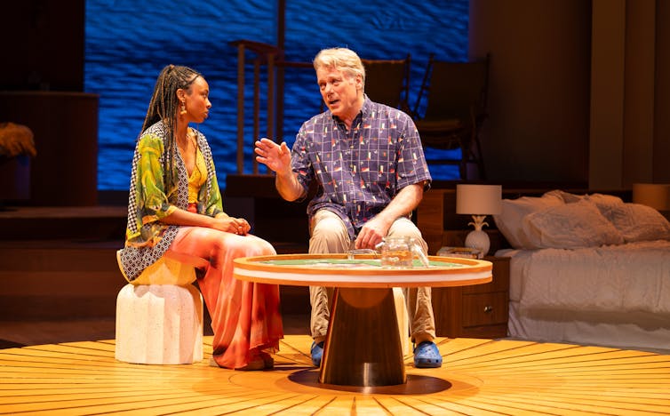 Production image, father and daughter talk.