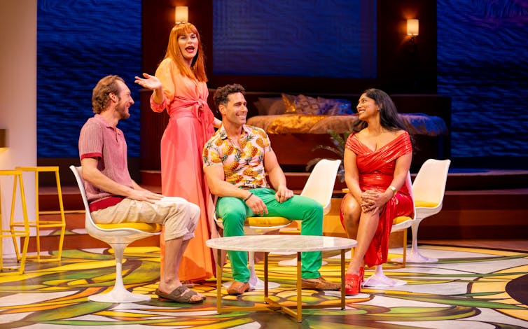 Production image: two couples talk.
