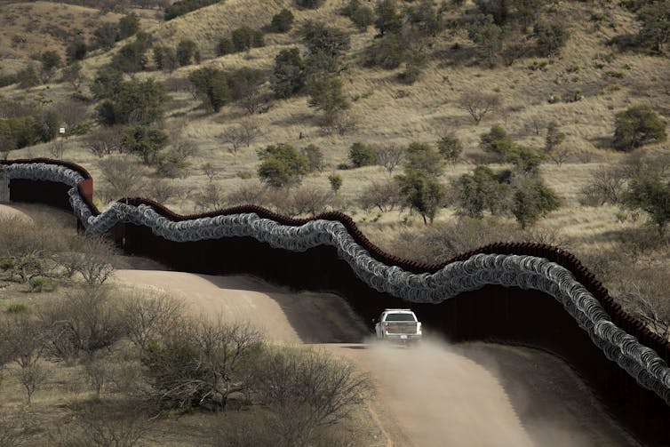 A long wall in the desert.
