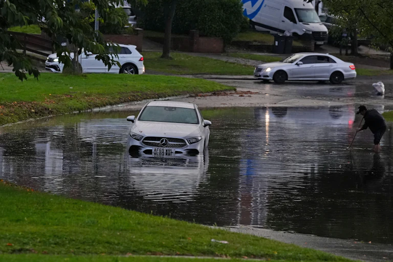 Car in flooded road