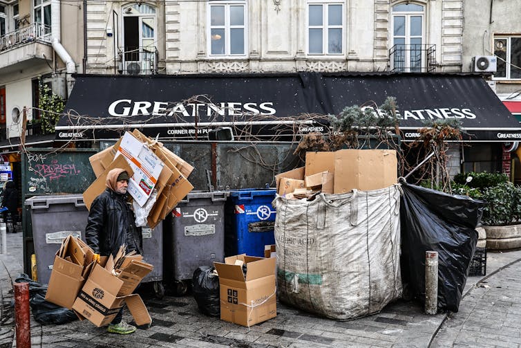 A waste picker collecting cardboard in Istanbul, Turkiye.