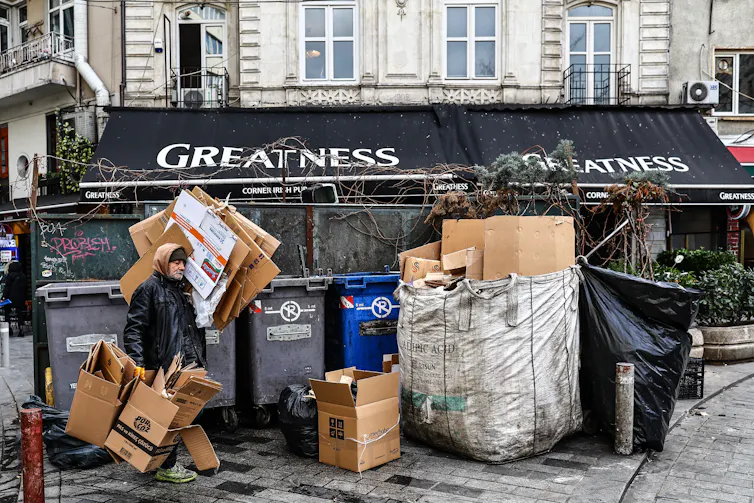 A waste picker collecting cardboard in Istanbul, Turkiye.