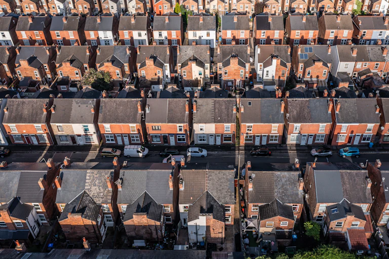 Aerial view of streets of houses in the UK