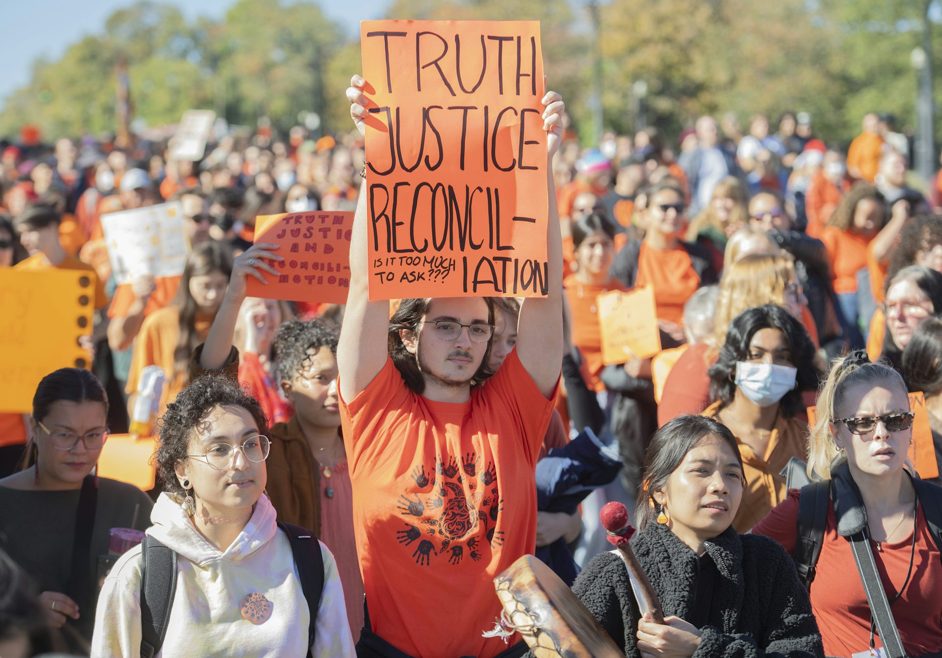 People take part in a march on National Day for Truth and Reconciliation in Montreal, Friday, September 30, 2022.