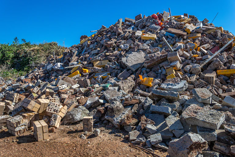 A pile of construction waste at a recycling centre