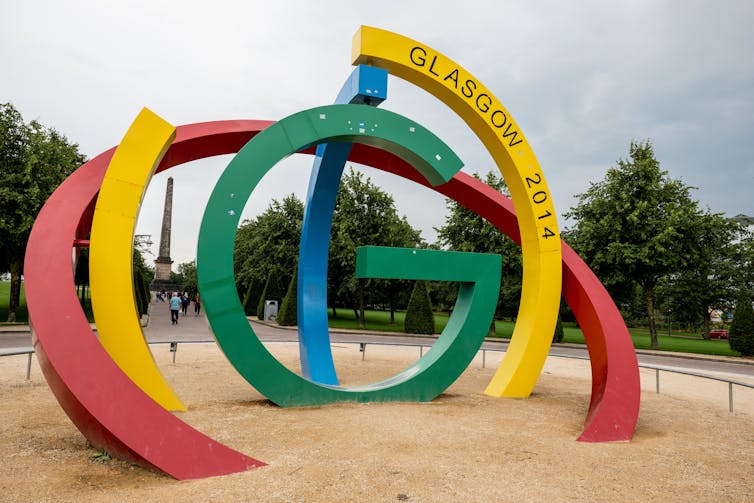 Brightly coloured monument marked 'Glasgow 2014'.