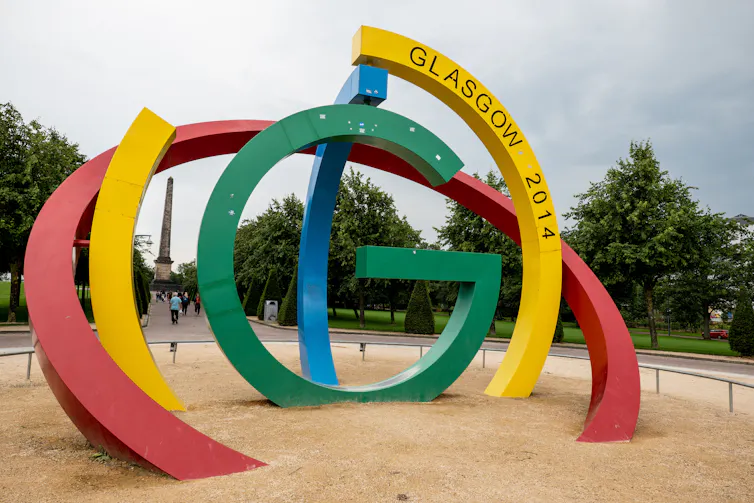 Brightly coloured monument marked 'Glasgow 2014'.
