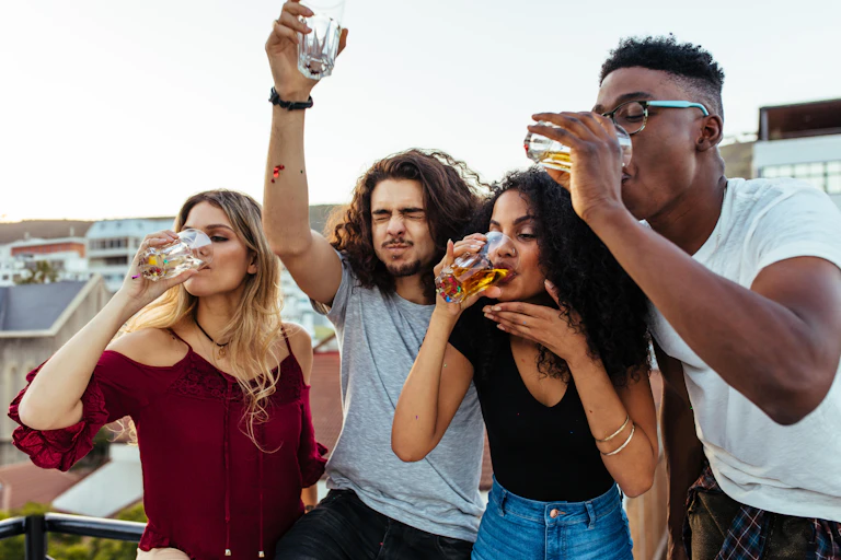 Young adults drinking alcohol